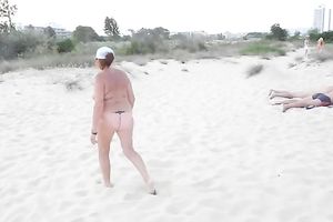 My corpulent mature BBC slut demonstrates her exposed body on a beach