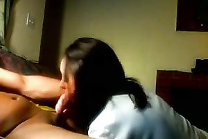 My ardent girlfriend looks sexy engulfing my pecker on camera