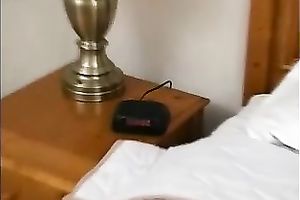 Sexy and bewitching redhead sweetheart stripteases in couch and masturbates