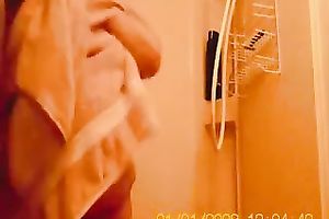 My bulky older girl in the baths on hidden webcam clip