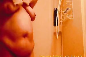 My bulky older girl in the baths on hidden webcam clip