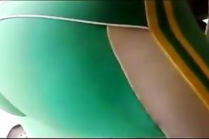 Lycra gym panties of green color on the butt of my sweetheart