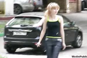 Sveta changes her garments in the street after peeing her panties