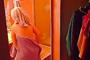 Hidden camera captures hawt milf getting changed and nude her titties and pussy