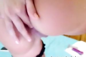 Brown haired legal age teenager with tasty mounds is fucking herself with her red vibrator