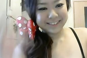 My exceedingly concupiscent Asian girlfriend is playing with her big scoops