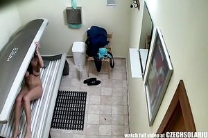 Awesome brunette hair hottie tanning her perfectly bald twat