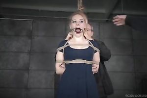 Playful blond floozy with ring gag in her throat receives her feet licked