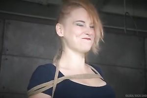 Playful blond floozy with ring gag in her throat receives her feet licked