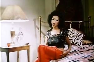 Hot brunette hair milf masturbates in front of a chunky man