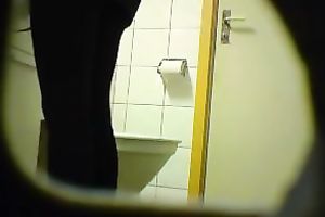 Skinny blond babe in the public restroom on hidden web camera