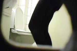 Skinny blond babe in the public restroom on hidden web camera