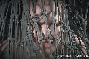 Salacious blondie bounded with fishnet receives her coochie toyed