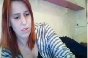 I am a stylish redhead and I like to show off my tasty love bubbles on livecam