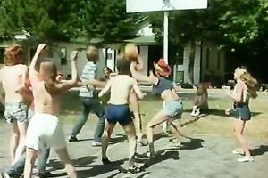 Stunning retro scene with coeds playing basketball outdoors