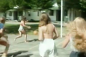Stunning retro scene with coeds playing basketball outdoors