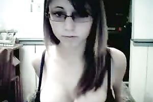 This four eyed cam-whore have to be proud of her large natural boobs