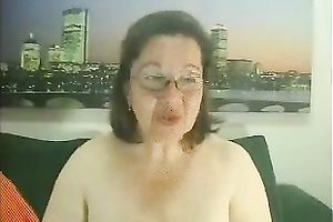 Exotic breasty granny is happily showing her old goodies