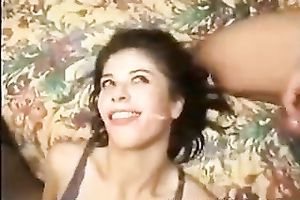 Gorgeous brunette hair cutie takes 2 loads of cum in her throat