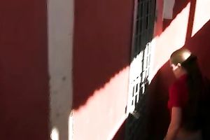 Skinny long-haired dark brown pees in her jeans in a public place
