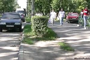 Skinny long-haired dark brown pees in her jeans in a public place