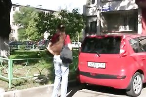 Skinny long-haired dark brown pees in her jeans in a public place