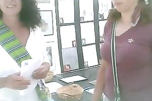 Pigtailed chick at a fair flashes her pants in hidden webcam video