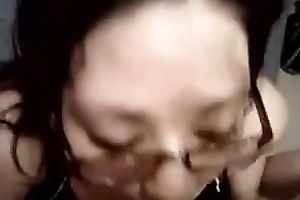 Petite brunette hair girlfriend in glasses blows jock for facial