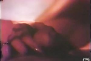 Retro movie scene with a woman engulfing a weiner in a club