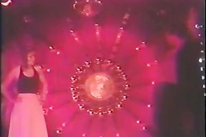 Retro movie scene with a woman engulfing a weiner in a club