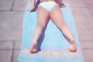 Redhead hussy wearing a bikini shows her body in homemade clip