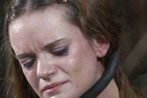 Nasty wench with miniature milk cans is placed into a restrain chair