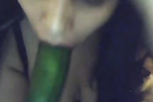 Busty Argentinian brunette hair hottie plays with a cucumber on cam