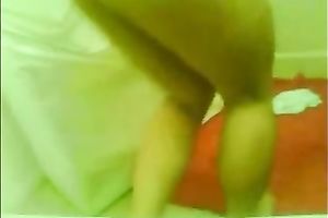 Webcam solo with an Asian legal age teenager toying her love tunnel in the washroom