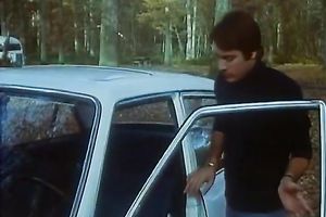 Cute blond fingers her love tunnel in a car and lets a fellow see her