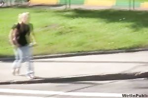 Irina soaks her jeans whilst walking down the city