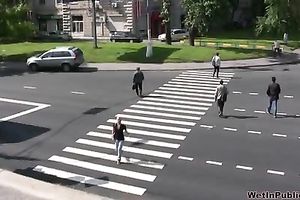 Irina soaks her jeans whilst walking down the city