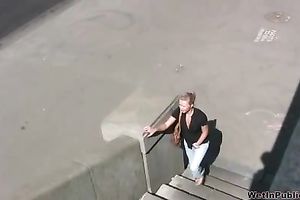 Irina soaks her jeans whilst walking down the city
