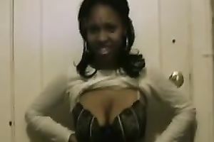 My ebony white women strips for me and then sucks my swollen dick
