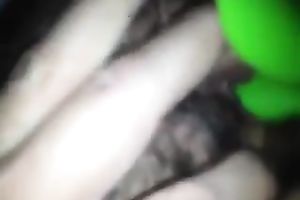 Fingering and permeating her hirsute and curly cunt with marital-device