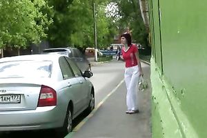 Tanya makes a puddle in a public place in urinate fetish movie