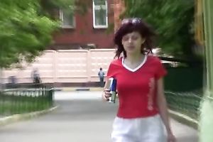 Tanya makes a puddle in a public place in urinate fetish movie
