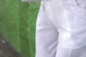 Tanya makes a puddle in a public place in urinate fetish movie