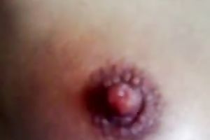 My perverted husband pumps her nipps and plays with them