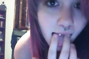 Nasty pierced legal age teenager entertains herself by rubbing her fine pussy