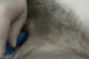 I love to tickle my bewitching slit with my sex toy in front of a webcam