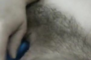 I love to tickle my bewitching slit with my sex toy in front of a webcam