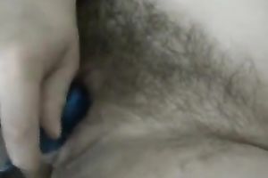 I love to tickle my bewitching slit with my sex toy in front of a webcam
