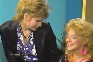 Skinny man polishes the snatch of a breasty blond white wife on the table