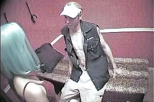 Sexy floozy in sexy outfit welcomes her next customer